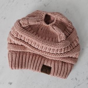 Pink BeanieTail Soft Stretch Cable Knit Messy Bun beanie hat